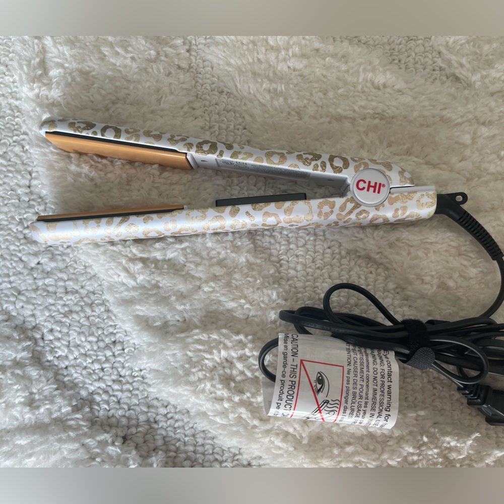 Used once CHI flat iron. Cheetah print!